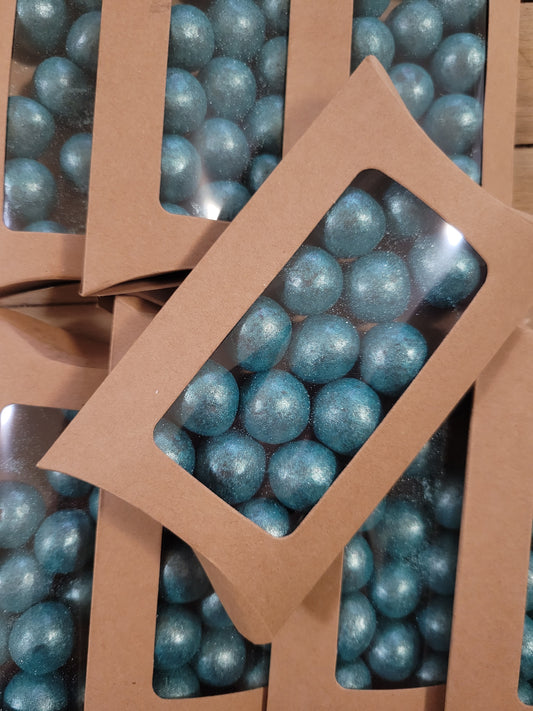 Milk chocolate covered malt balls